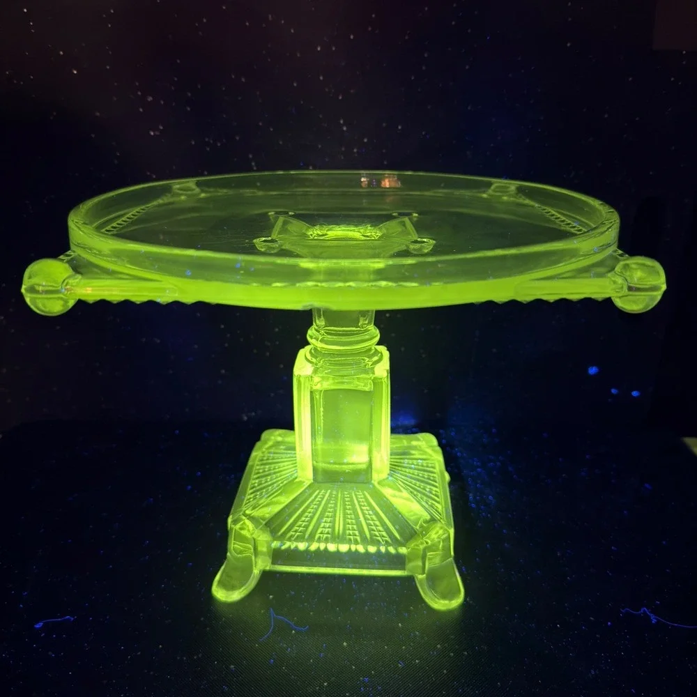 Antique Adams & Co Manganese Glow Glass Cake Stand 8in Tall 10in Wide Clear EAPG